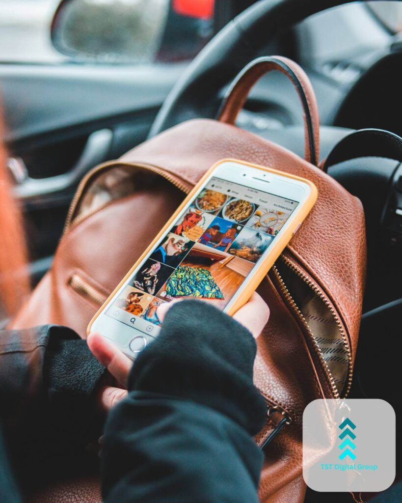 Person scrolling through a social media feed on a smartphone, showcasing data-driven PPC optimization and advertising solutions by TST Digital Agency in Alamo Heights, San Antonio, Texas.