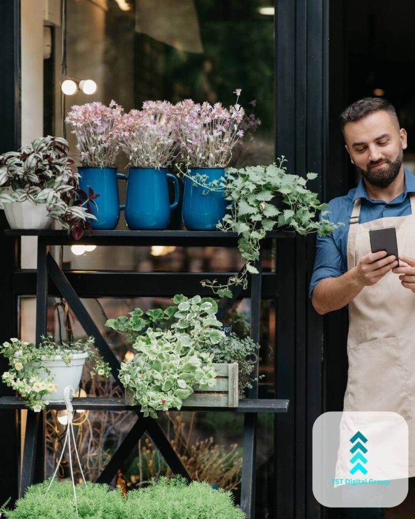 Male florist using smartphone for online PPC advertising and digital marketing with TST Digital Agency in Schertz, Texas near San Antonio.